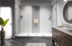 Modern shower renovation featuring a spacious design, sleek tile walls, and a stylish vanity with natural light, ideal for enhancing bathroom aesthetics in Port Charlotte.