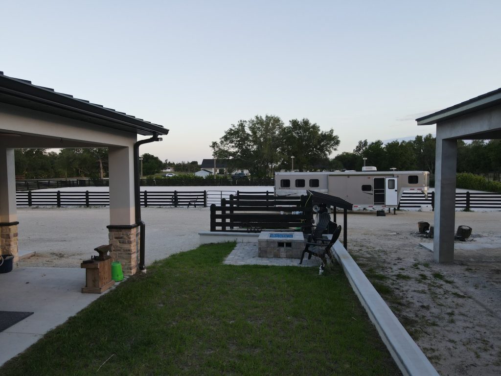 Custom horse barn with covered stalls built by Build Rite Builders on a Southwest Florida equestrian property