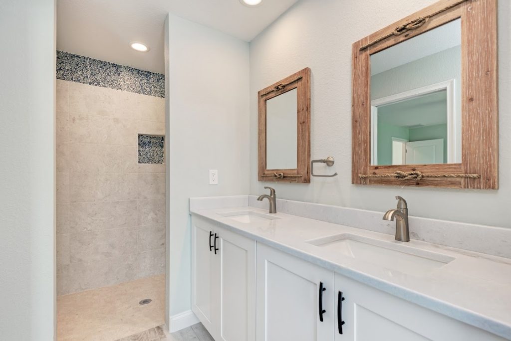 Remodeled bathroom with new cabinetry completed by Build Rite Builders in Venice, FL