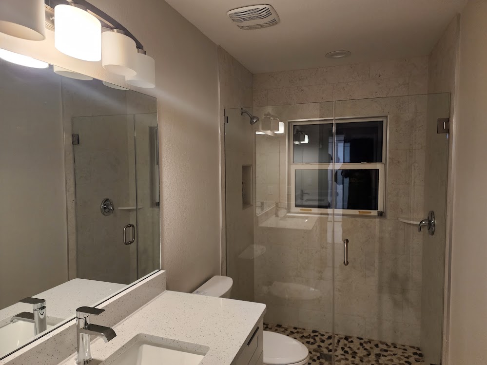 Remodeled Bathroom with new cabinetry completed by Build Rite Builders in Venice, FL