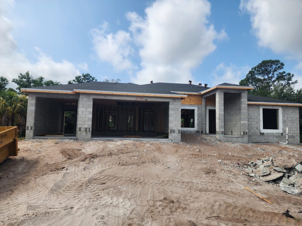 Canal-front custom home with boat lift in South Gulf Cove, FL